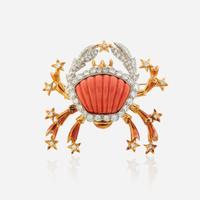A coral, diamond, and bicolor gold pendant/brooch