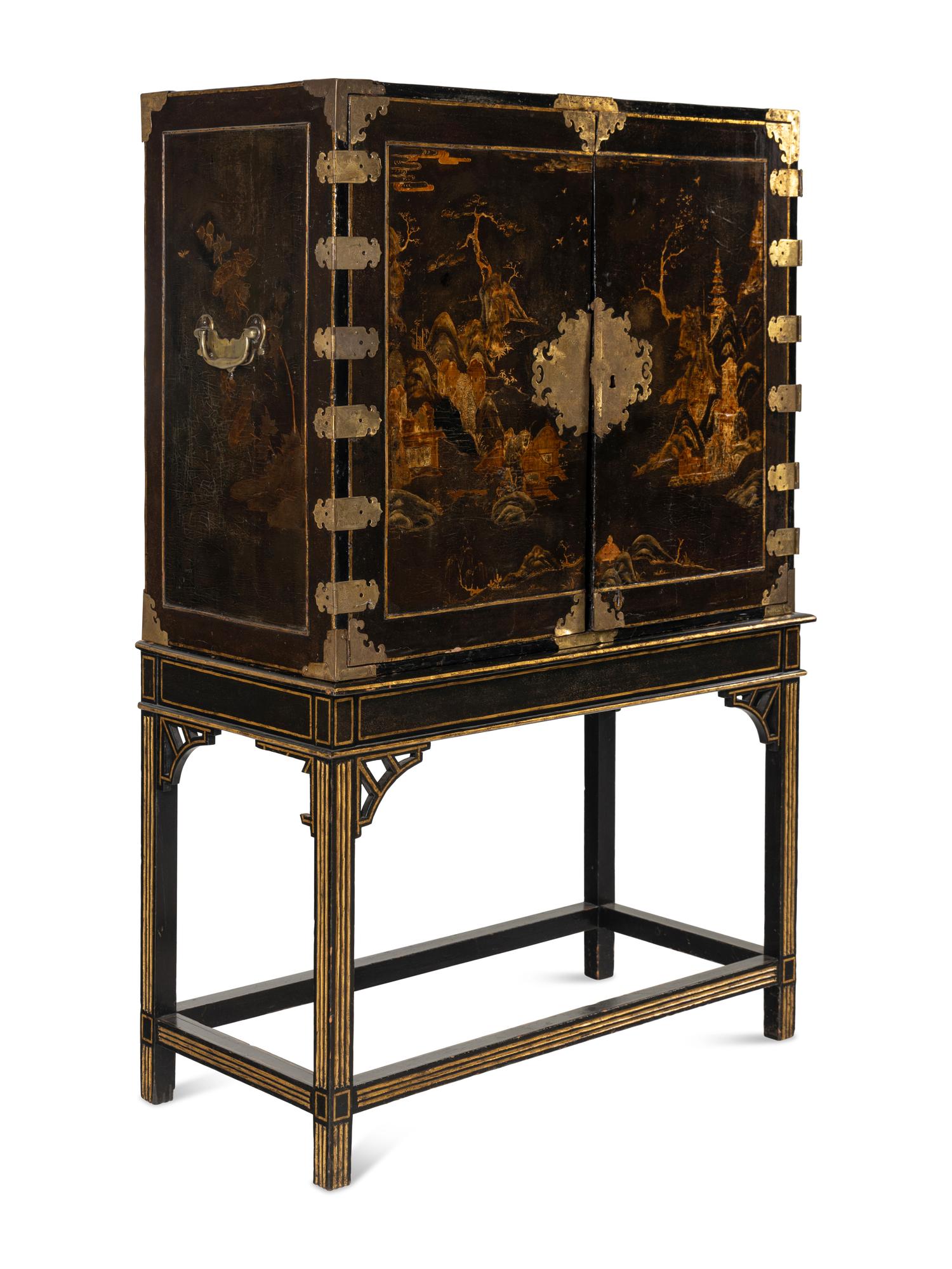 A Japanese Lacquer and Brass Mounted Cabinet on Stand