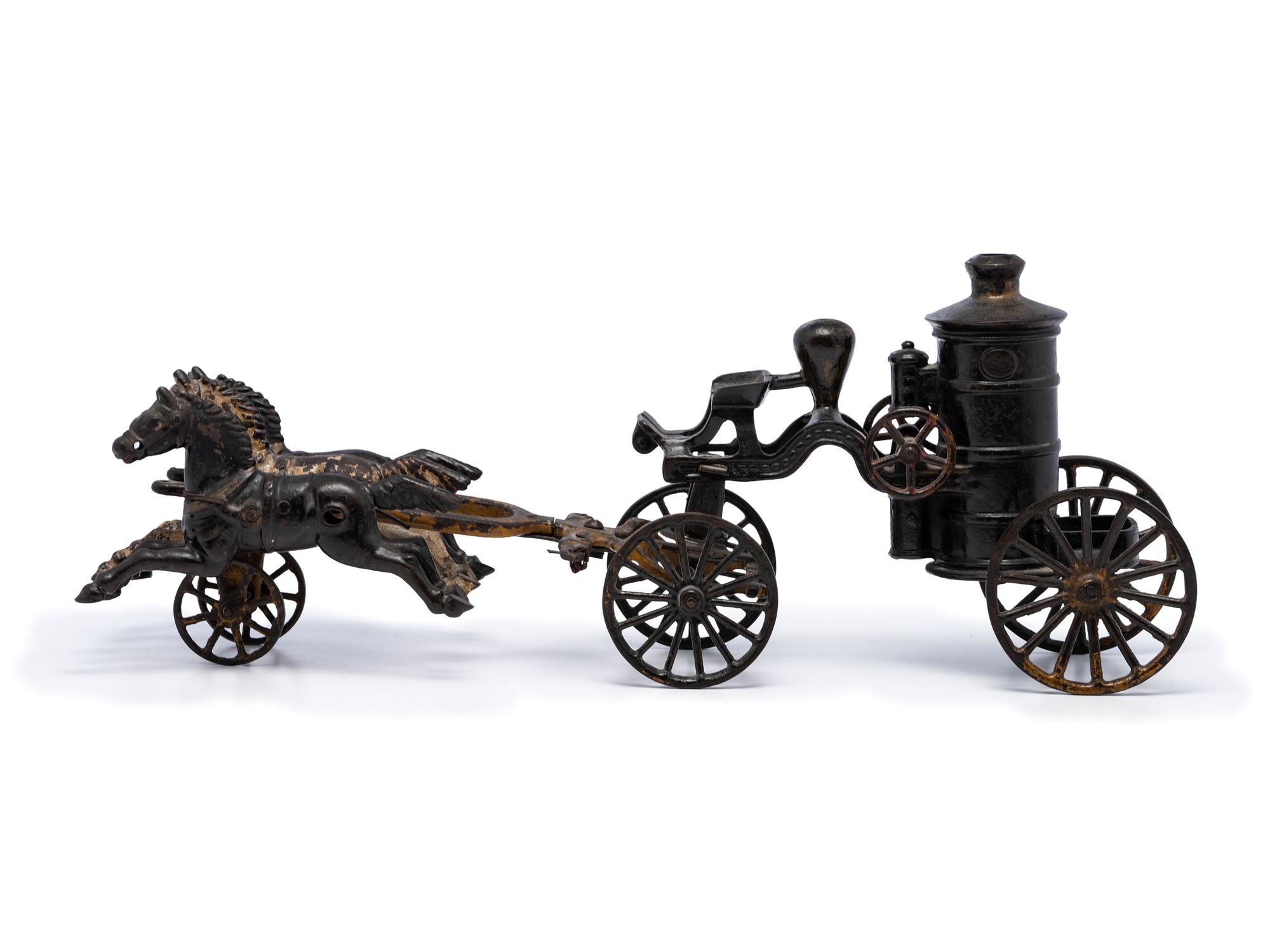 A Painted Cast Iron Horse Train Fire Wagon