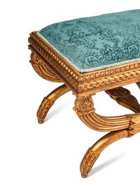 A Pair of Italian Neoclassical Style Carved Giltwood Curule-Form Benches