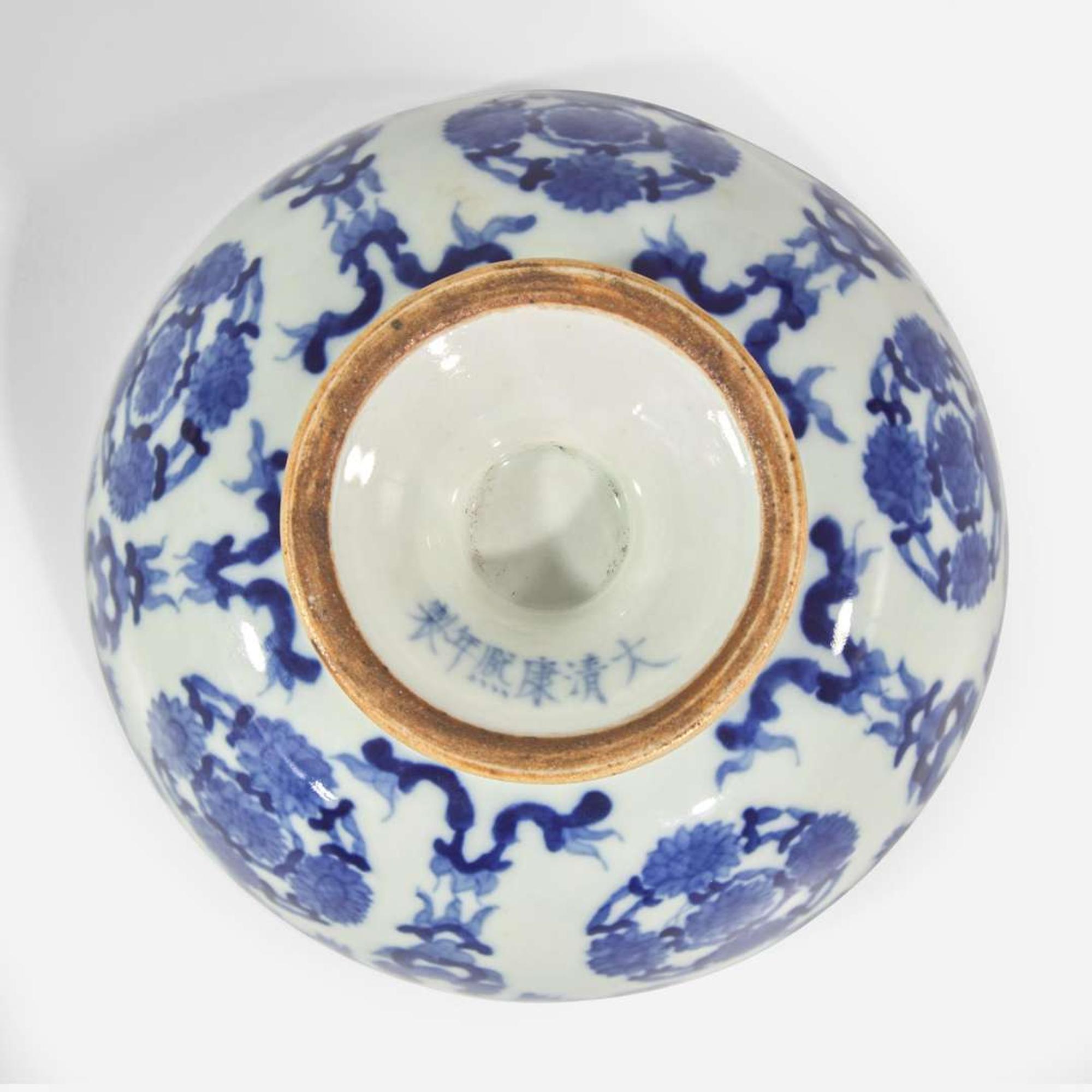 An unusual Chinese blue and white porcelain rotating footed bowl 青花转底碗 Kangxi marks but later ??? ????