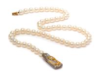 An 18 Karat Two Tone Gold, Cultured South Sea Pearl and Diamond Necklace, 6.20 dwts. (brooch only)