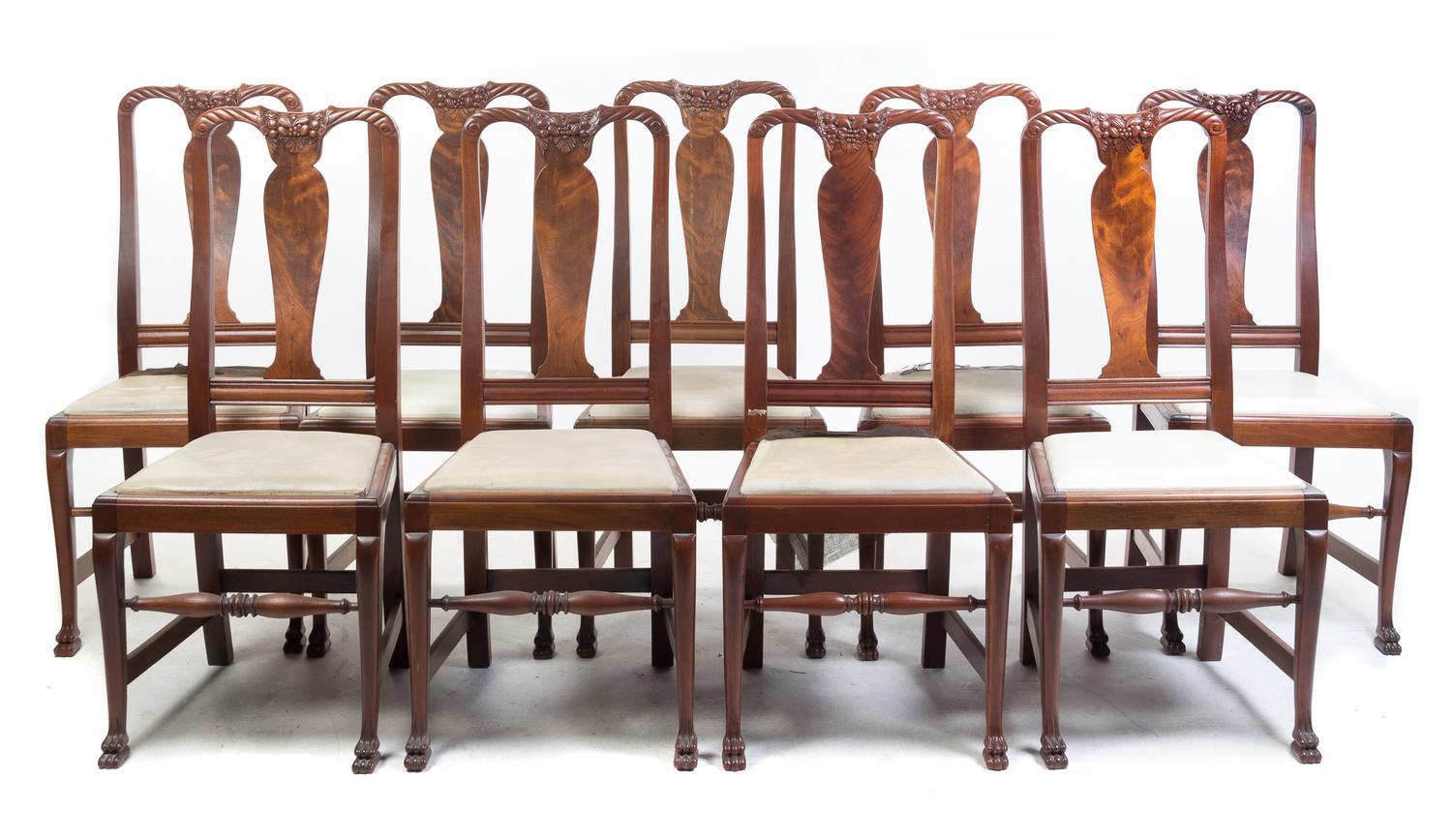 A Set of Twelve Carved Mahogany Side Chairs Height 41 inches. — 20TH CENTURY