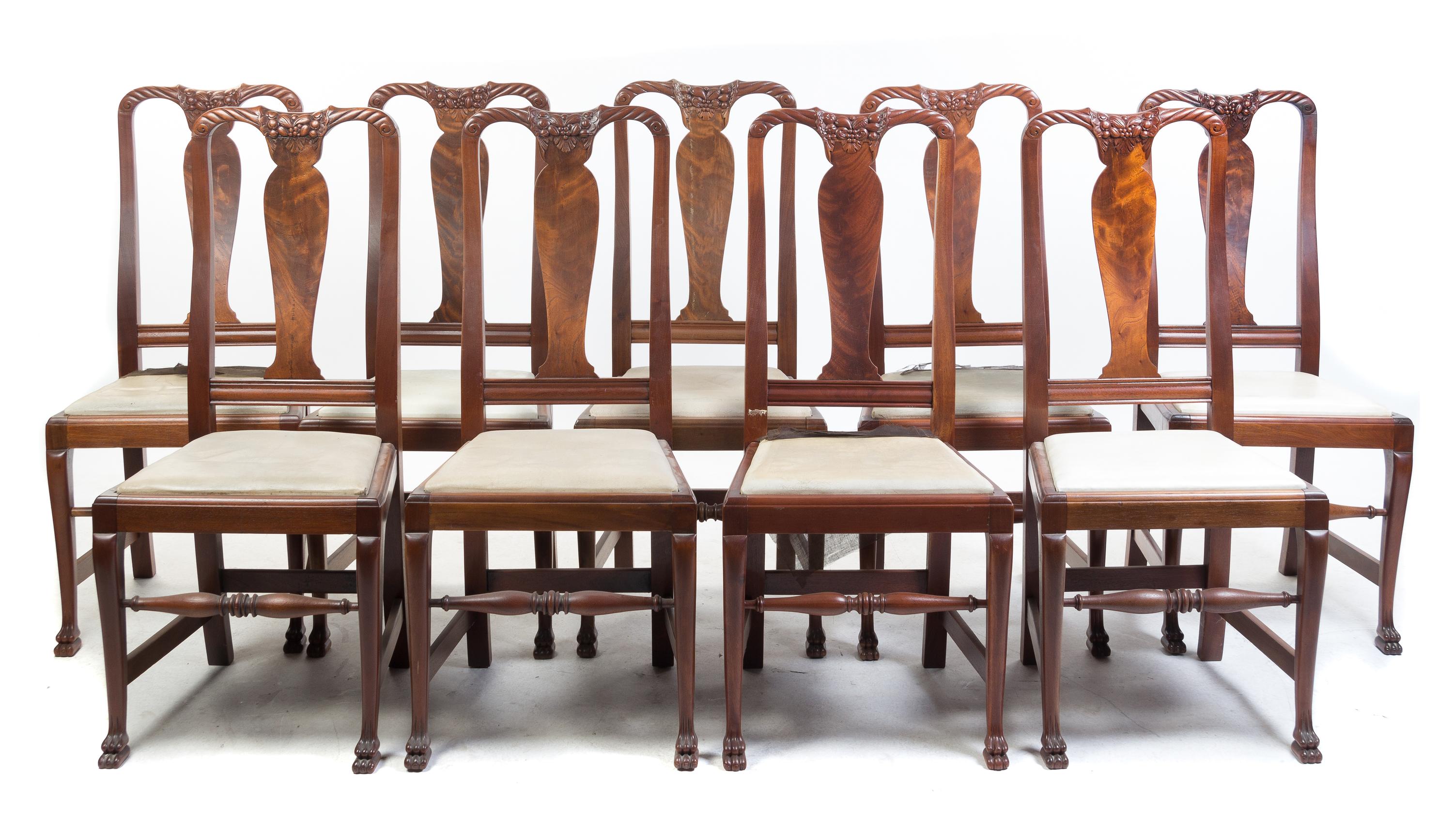 A Set of Twelve Carved Mahogany Side Chairs Height 41 inches. — 20TH CENTURY