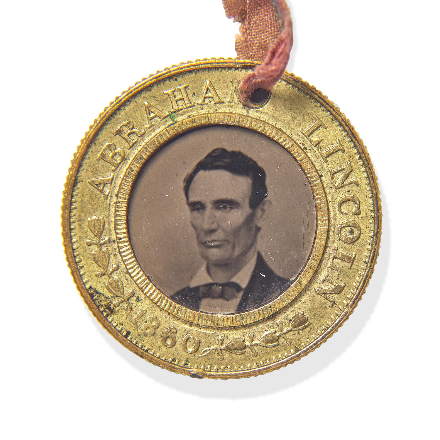 [LINCOLN-HAMLIN CAMPAIGN]. A presidential campaign token featuring ferrotype portraits of Lincoln and Hamlin, ca. 1860.