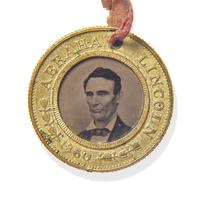 [LINCOLN-HAMLIN CAMPAIGN]. A presidential campaign token featuring ferrotype portraits of Lincoln and Hamlin, ca. 1860.