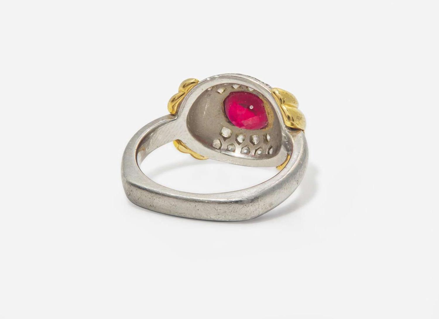 A Ladies Platinum, 18K Yellow Gold, Ruby, and Diamond Ring