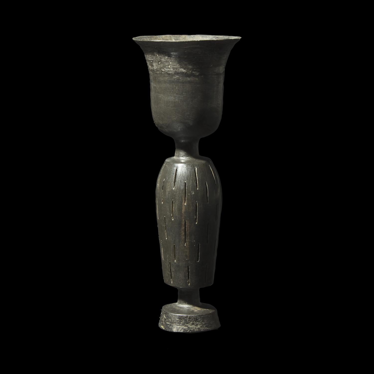 A Chinese Burnished Black 'Eggshell' Pottery Stem Cup, Neolithic Period, Longshan Culture 龍山文化 蛋殼黑陶高柄杯