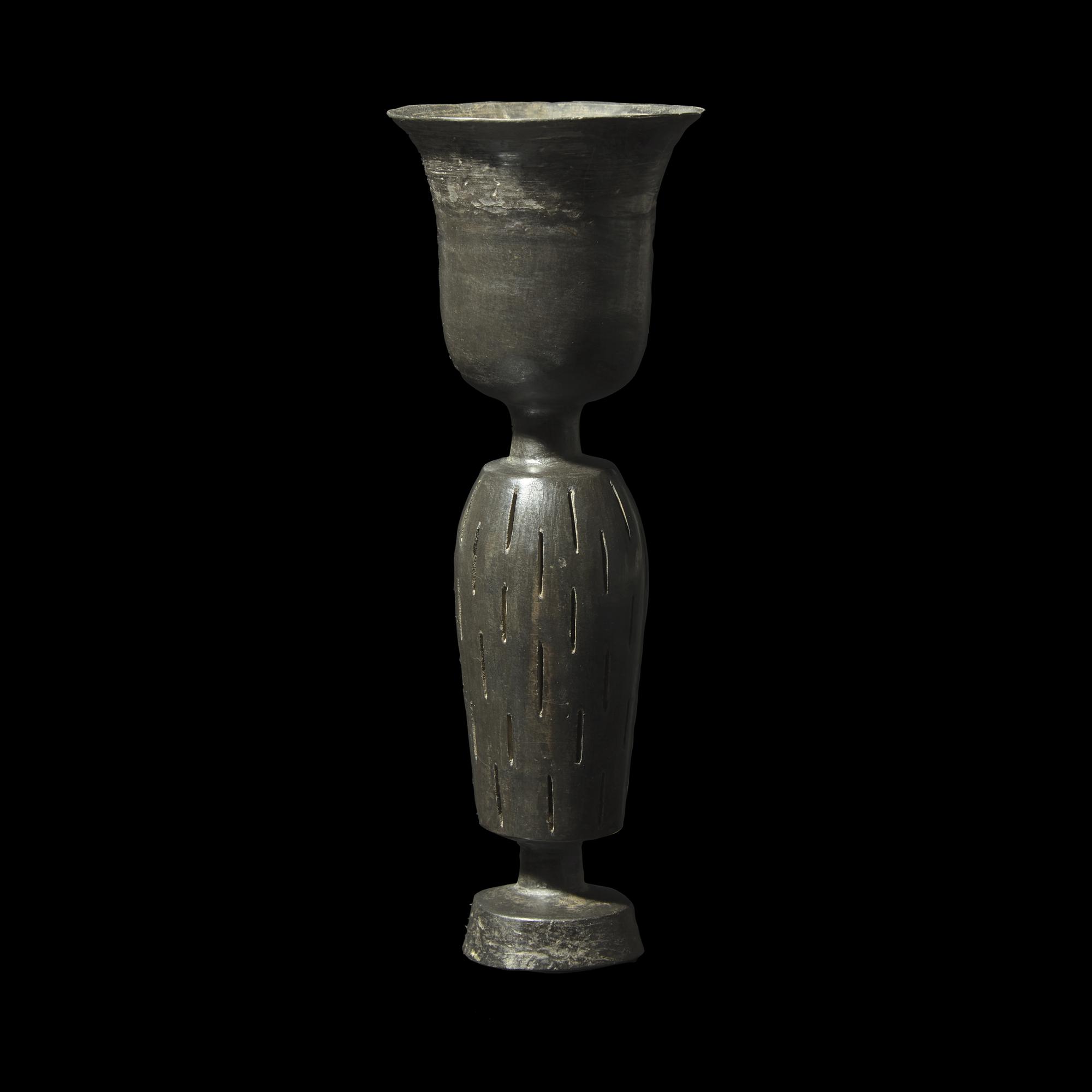 A Chinese Burnished Black 'Eggshell' Pottery Stem Cup, Neolithic Period, Longshan Culture 龍山文化 蛋殼黑陶高柄杯