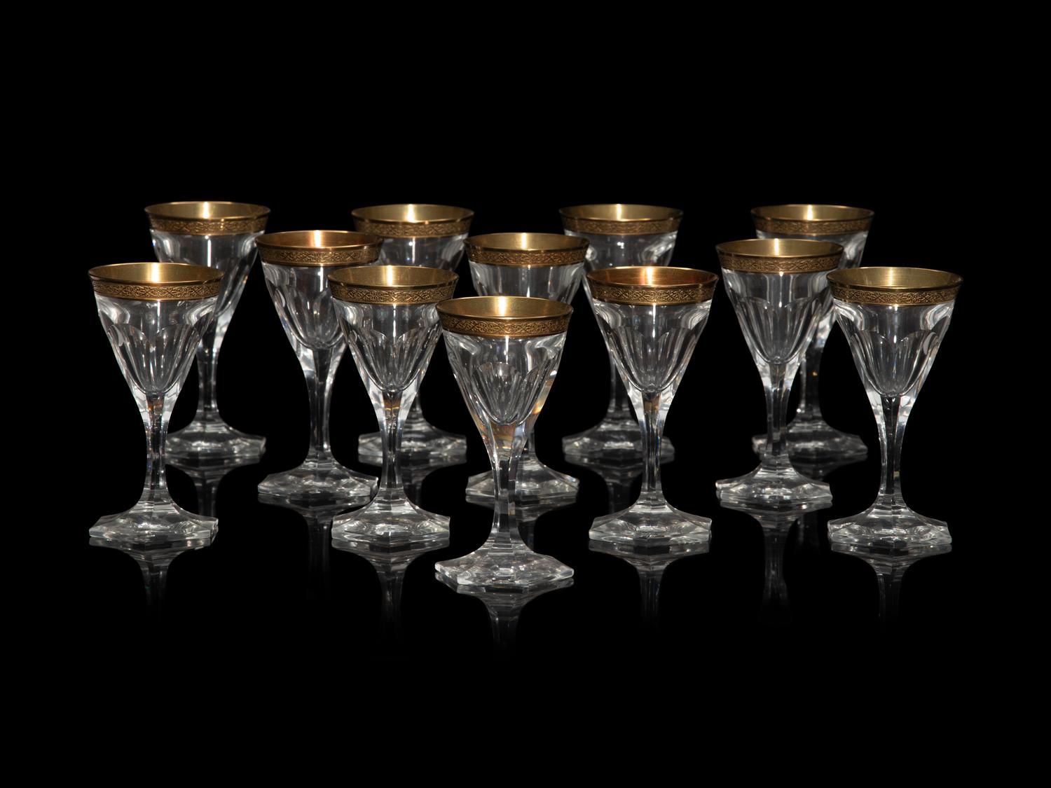 A Moser Gilt Decorated Glass Stemware Service