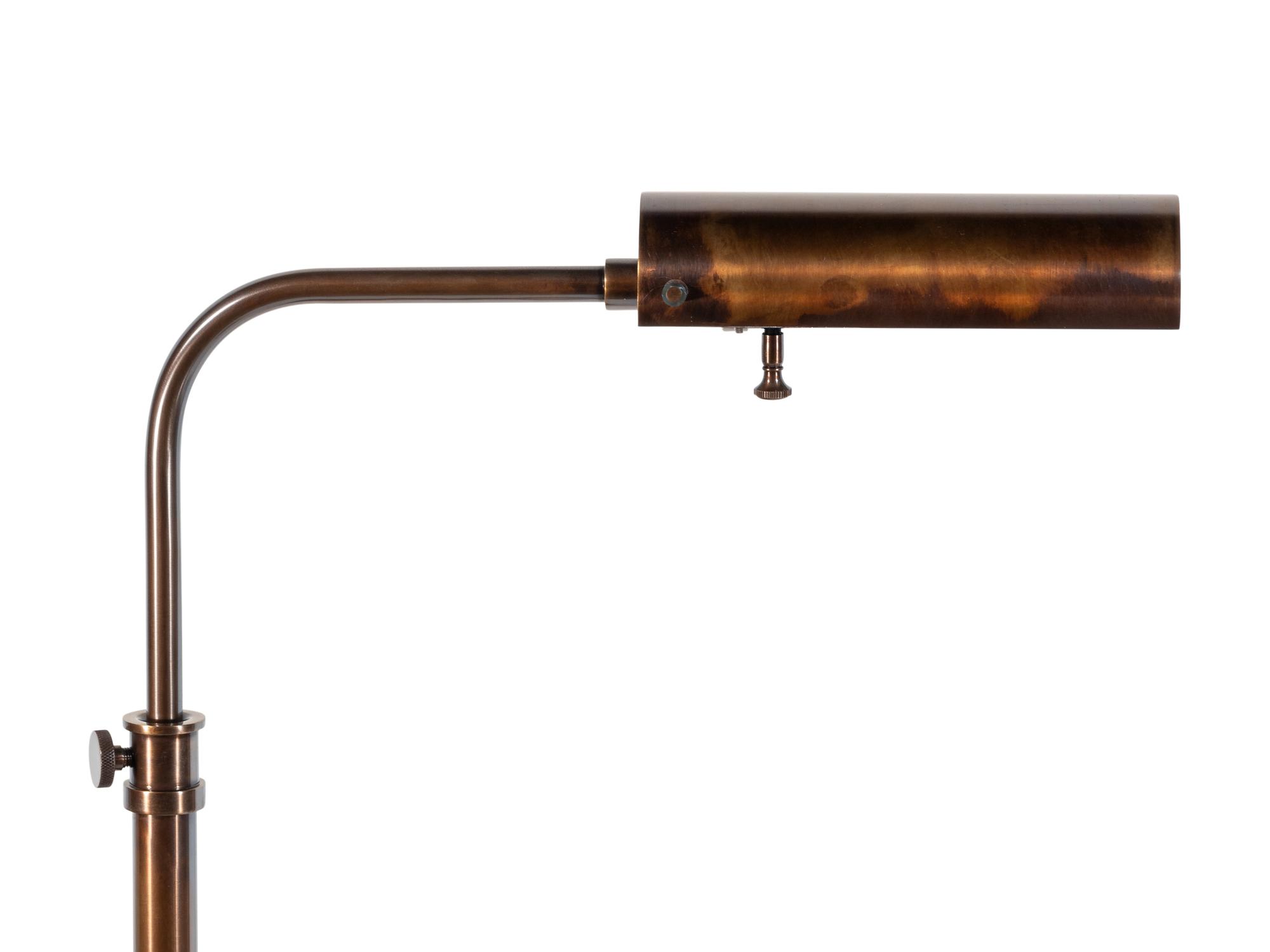 A Set of Four of Bronze-Tone Cantilevered Reading Lamps