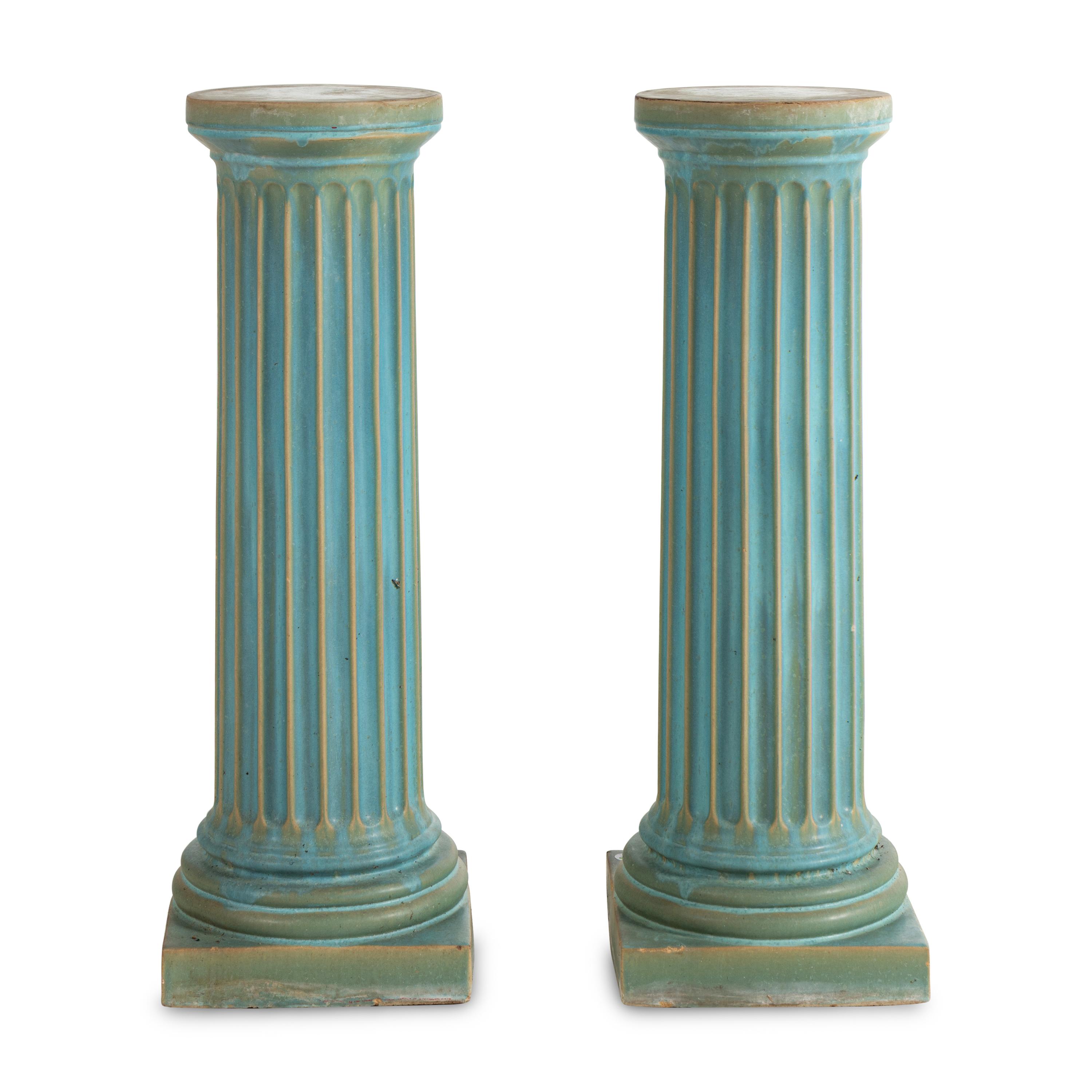 A Pair of Turquoise-Glazed Earthenware Pedestals