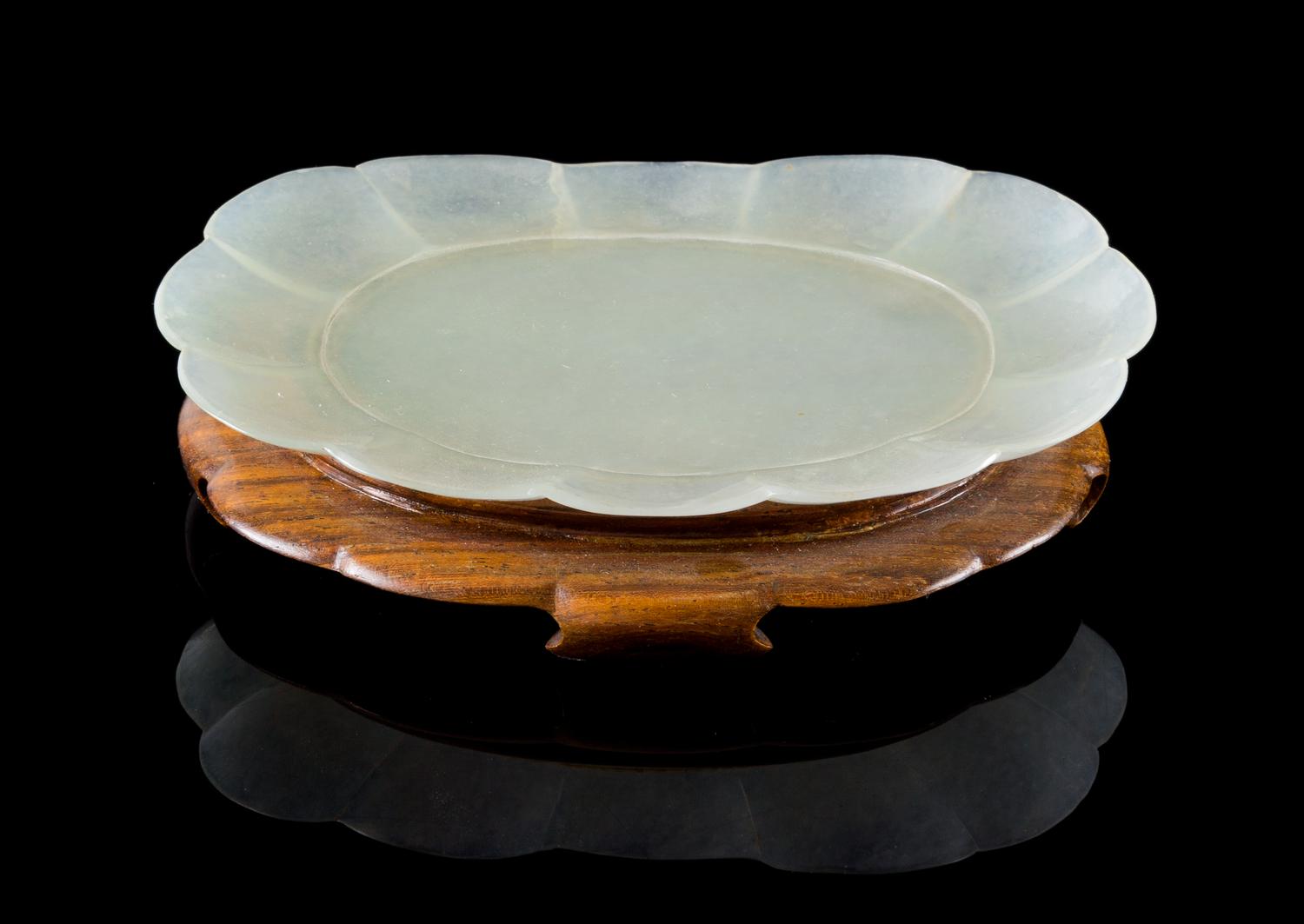 A Pale Celadon Jade Dish Length 4 3/8 inches.
