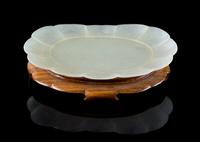 A Pale Celadon Jade Dish Length 4 3/8 inches.
