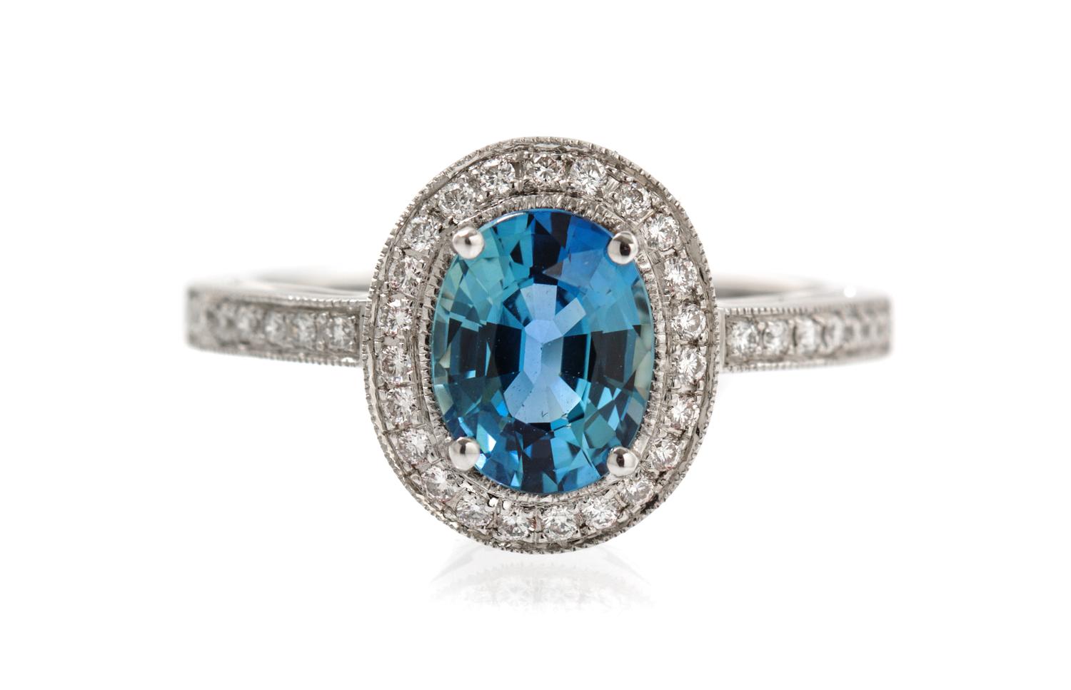 An 18 Karat White Gold, Sapphire and Diamond Ring, 2.80 dwts.