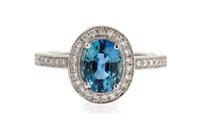 An 18 Karat White Gold, Sapphire and Diamond Ring, 2.80 dwts.