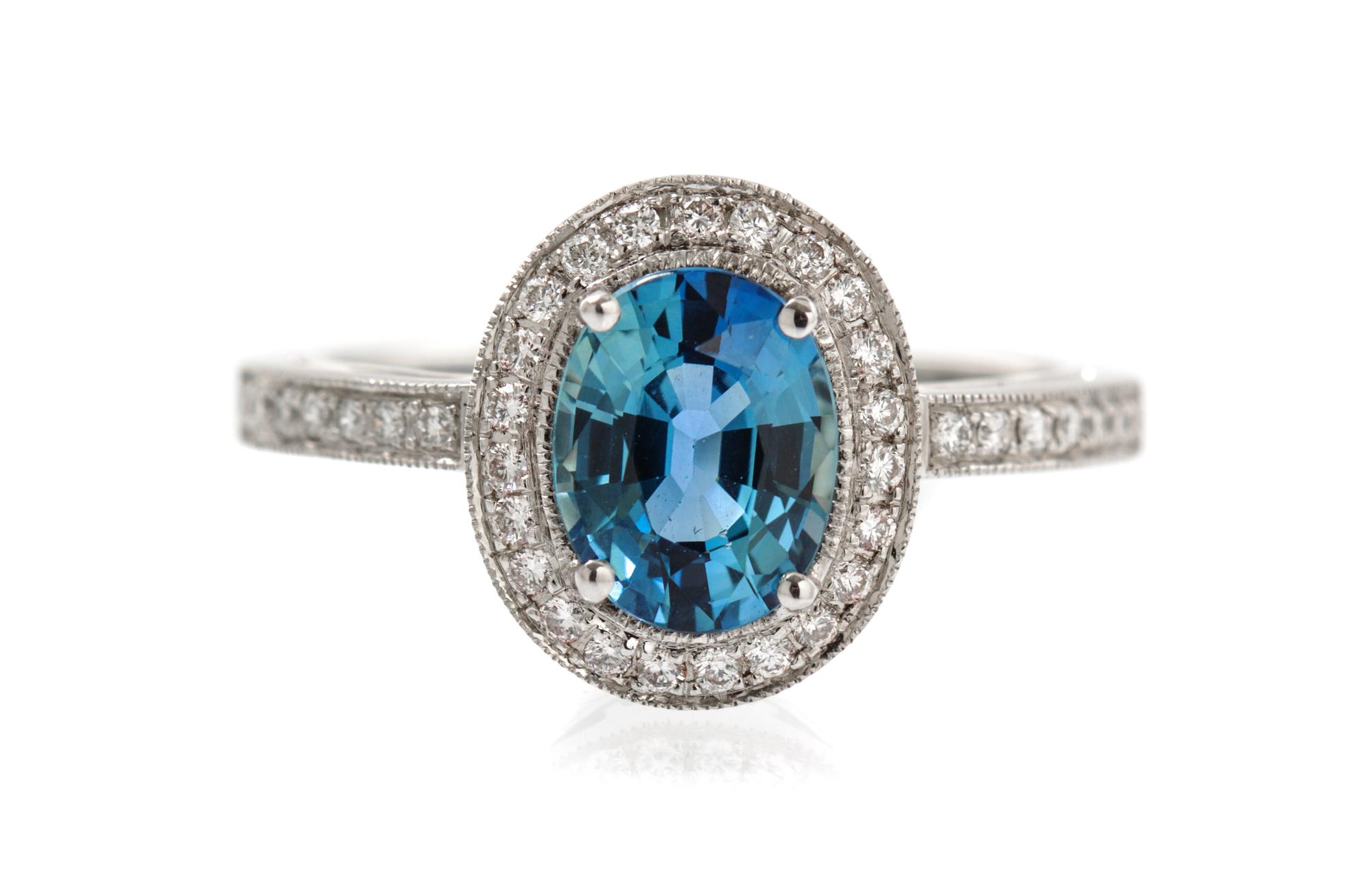 An 18 Karat White Gold, Sapphire and Diamond Ring, 2.80 dwts.