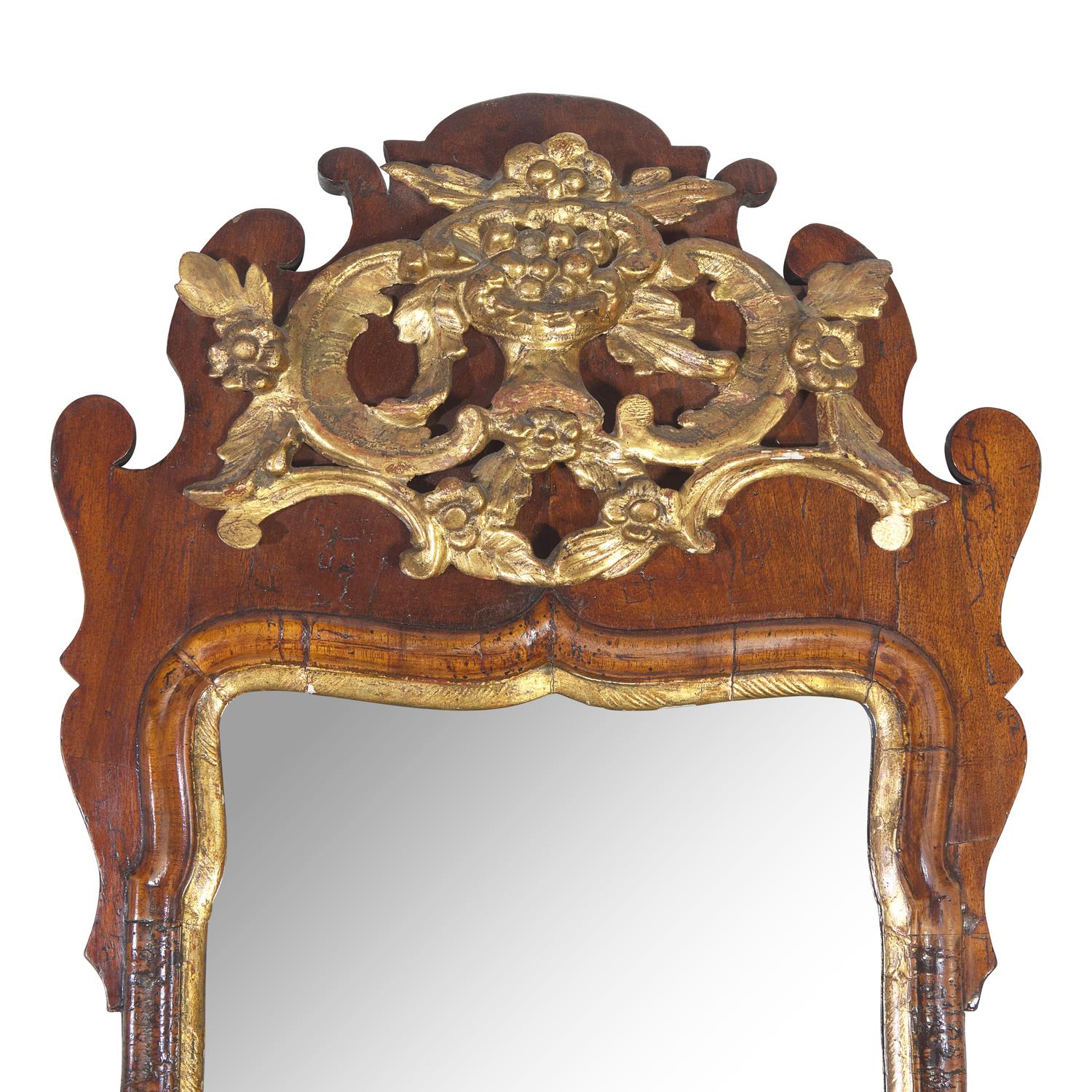 A George I Mahogany and Giltwood Looking Glass with Brass Candlearms