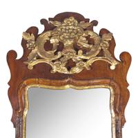 A George I Mahogany and Giltwood Looking Glass with Brass Candlearms