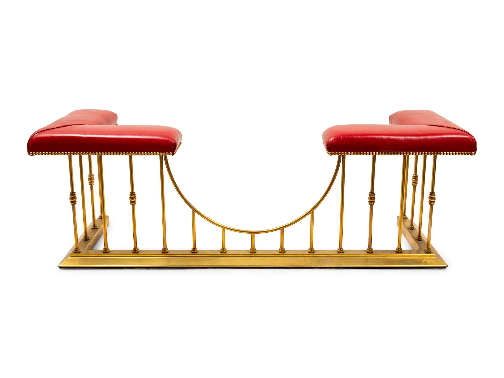 A Brass and Leather-Upholstered Club Fender