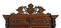 A German Carved Oak Hunt Cabinet