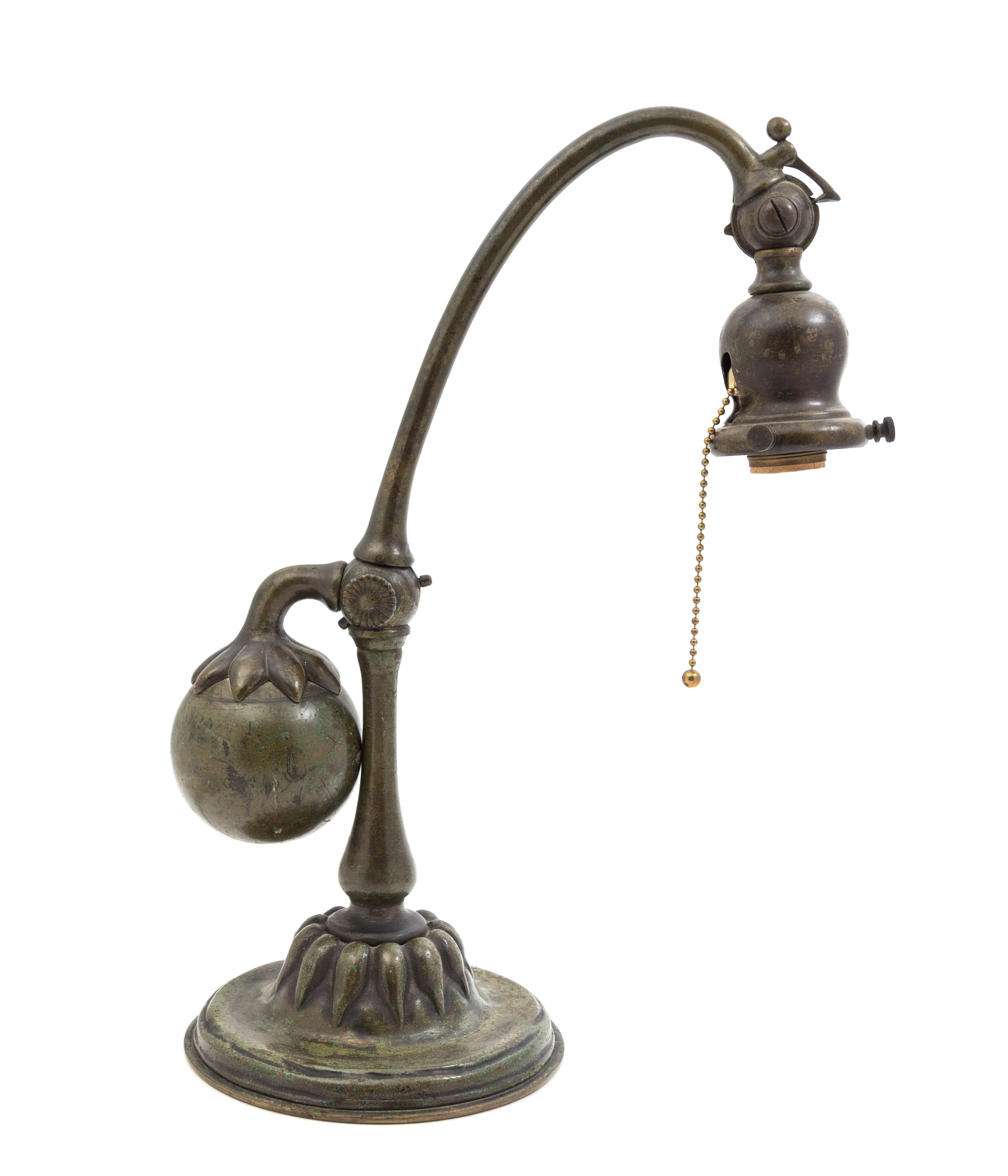 A Tiffany Studios Bronze Counter Balance Lamp Base Height 15 3/4 inches.