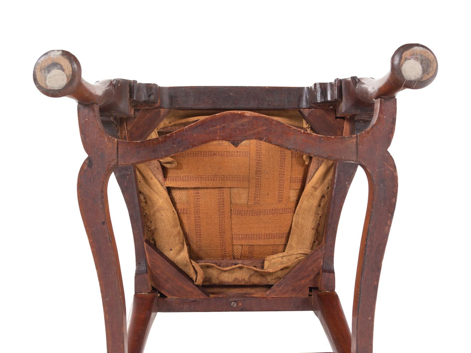 A Queen Anne Volute Carved Walnut Flat-Stretcher Pad-Foot Side Chair