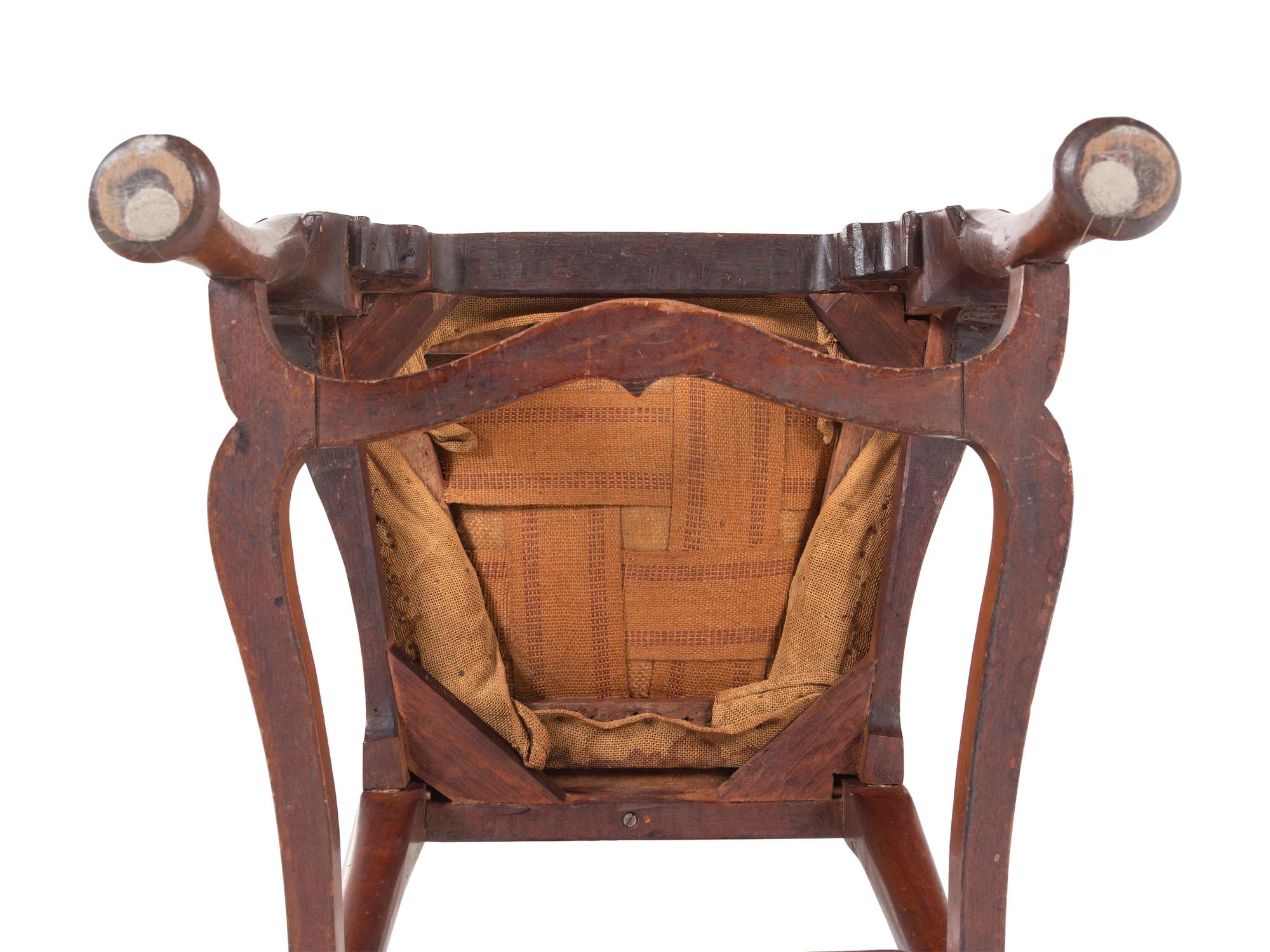 A Queen Anne Volute Carved Walnut Flat-Stretcher Pad-Foot Side Chair