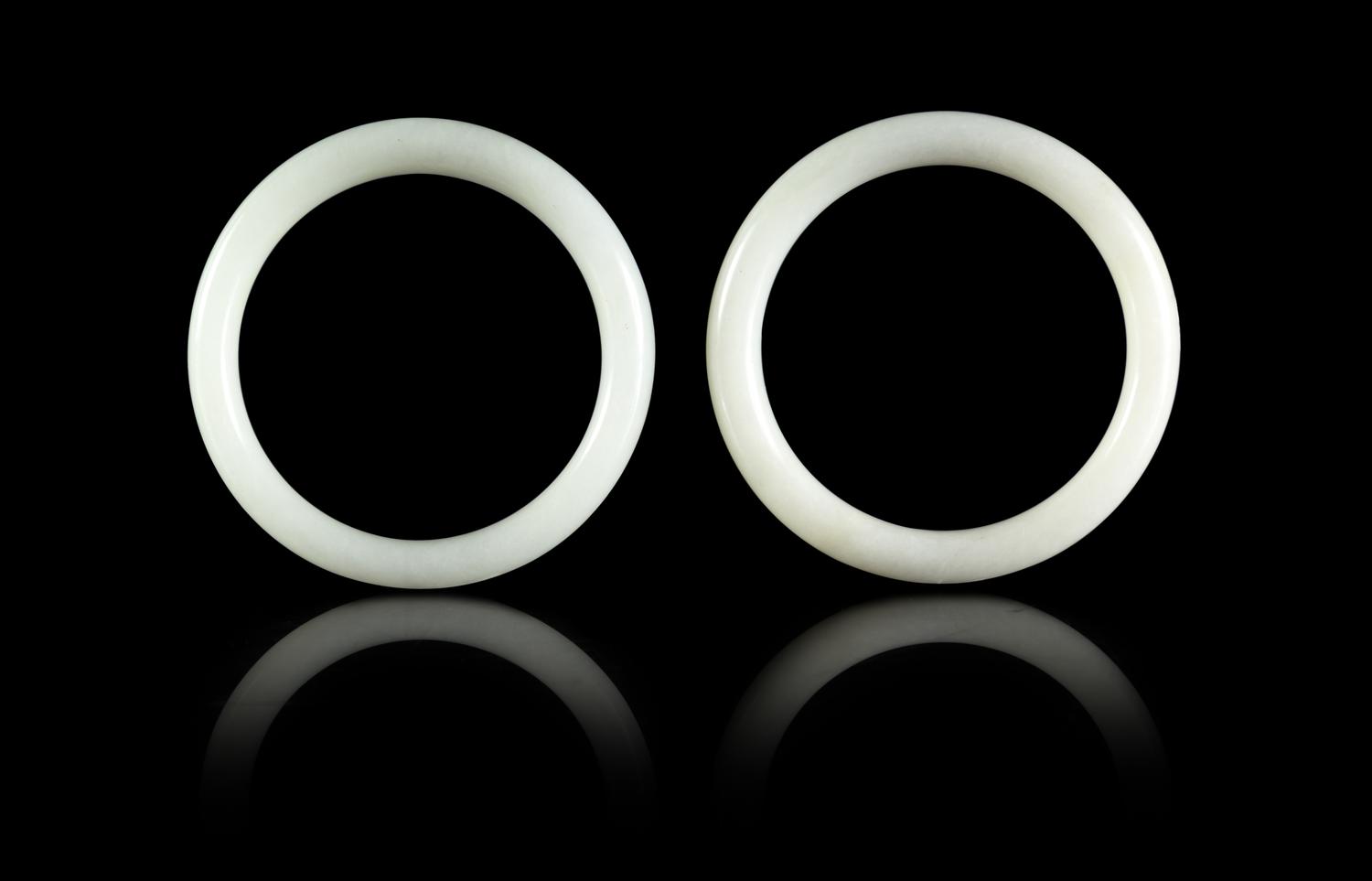 A Pair of Chinese White Hardstone Bangles