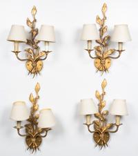 Four Gilded Two-Light Sconces Length 19 3/4 inches.
