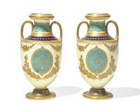 A Pair of English Gilt Decorated Porcelain Urns