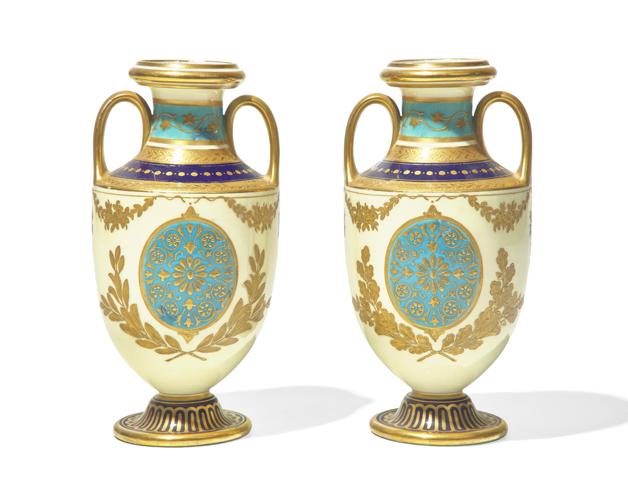 A Pair of English Gilt Decorated Porcelain Urns