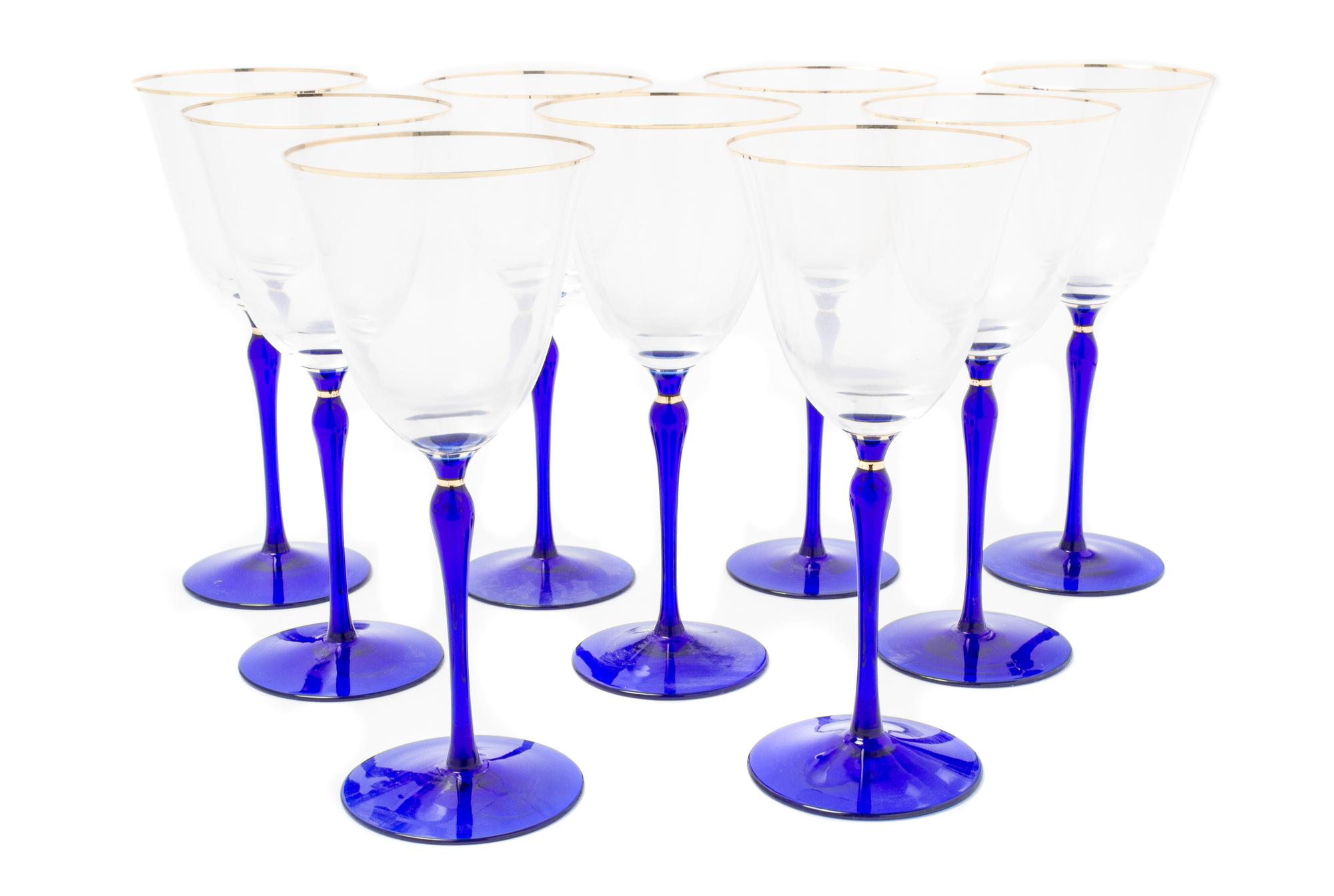 A Set of Nine Glass Wine Stems Height 8 5/8 inches.