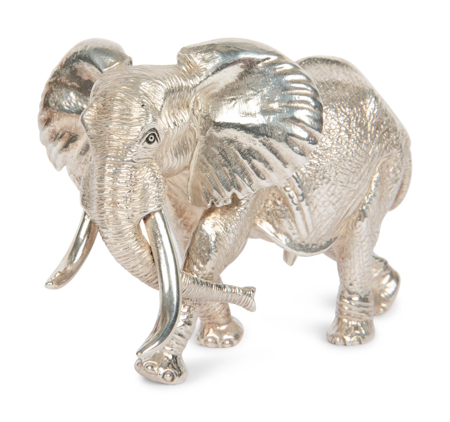 A Group of Nine Patrick Mavros Silver Elephants