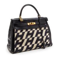 A Rare Hermes 35cm Ulysses Black Leather and Ivory Canvas Kelly Bag, 13 x 9 x 5 inches.
