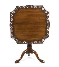 A Chippendale Style Mahogany Tilt-Top Tea Table, Height 28 1/4 x width 31 inches.