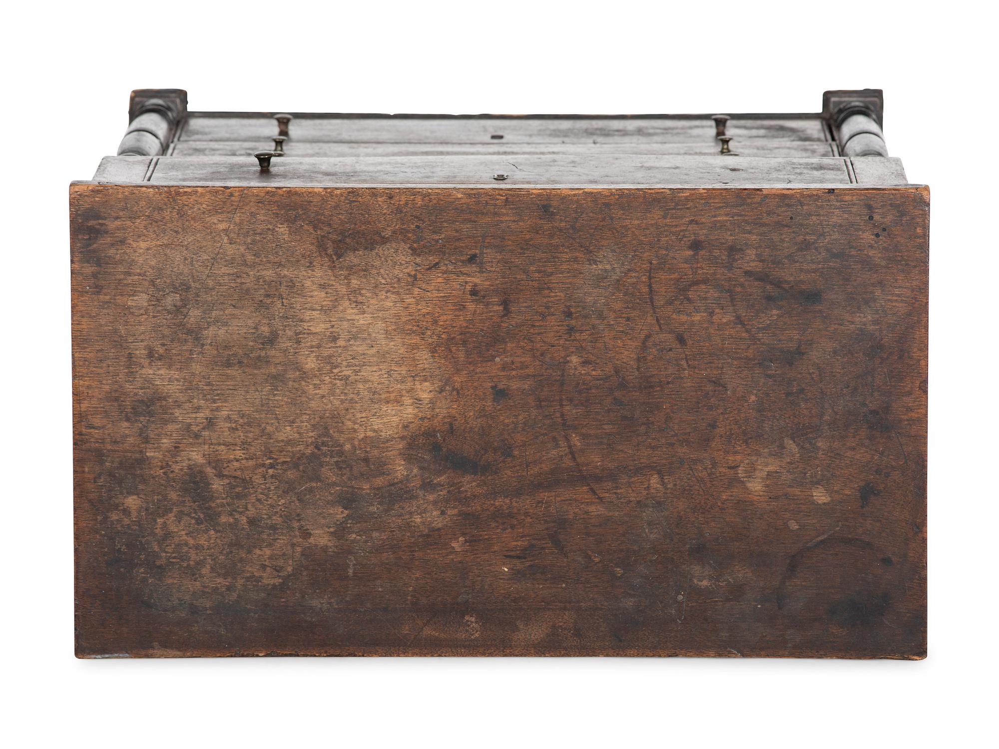 A Late Federal Parcel Ebonized Walnut Diminutive Child's Chest of Drawers