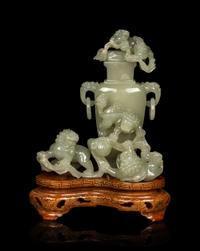 A Chinese Pale Celadon Jade Vase and Cover