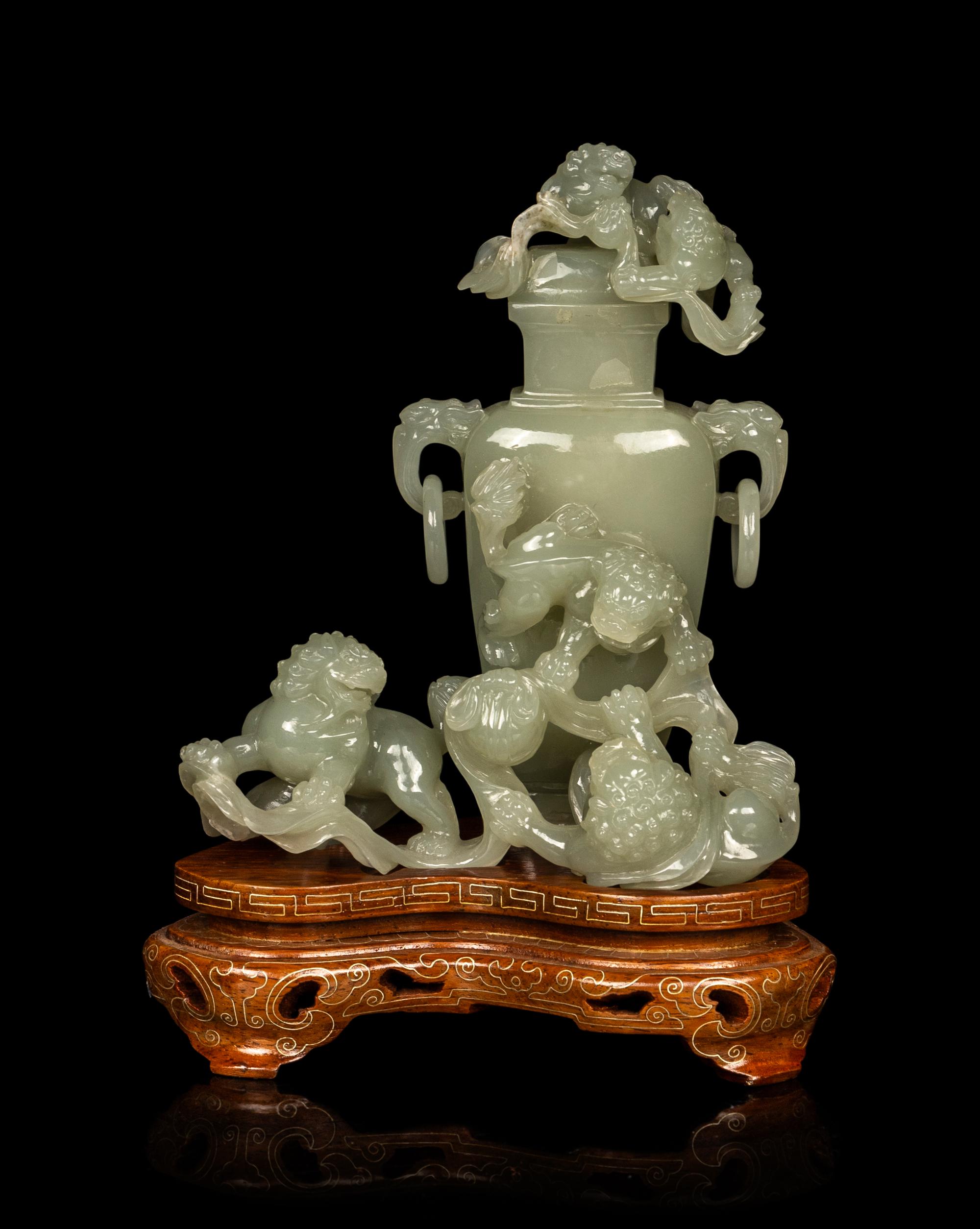 A Chinese Pale Celadon Jade Vase and Cover