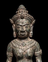 A Khmer Bronze Figure of a Deity