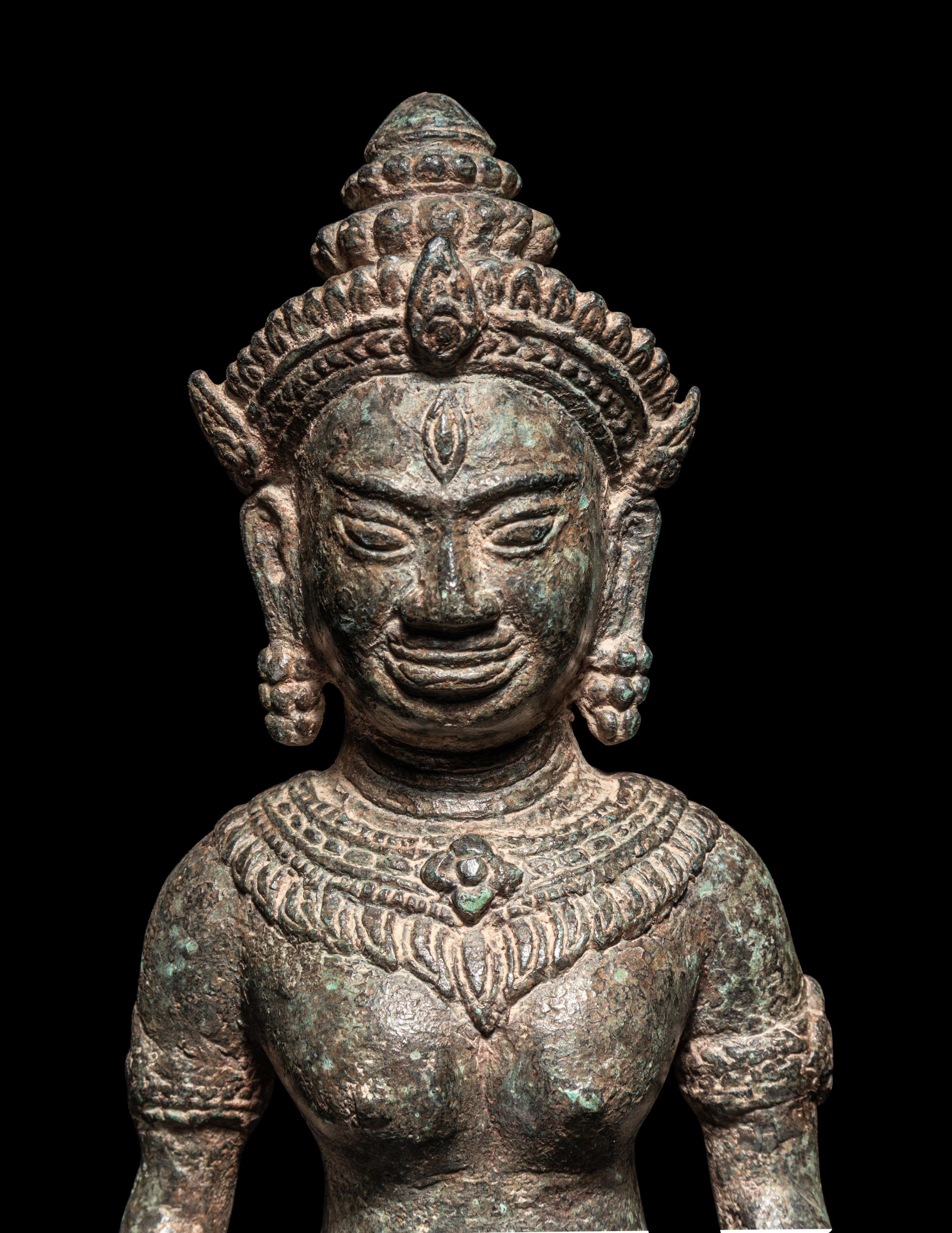 A Khmer Bronze Figure of a Deity