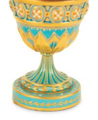 A Pair of Sèvres Style Porcelain Urns and Covers