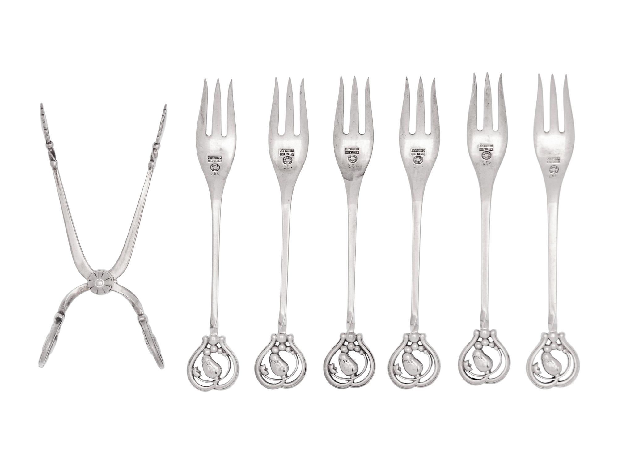 A Set of Six Georg Jensen Silver Flat Blossom Pattern Cocktail Forks