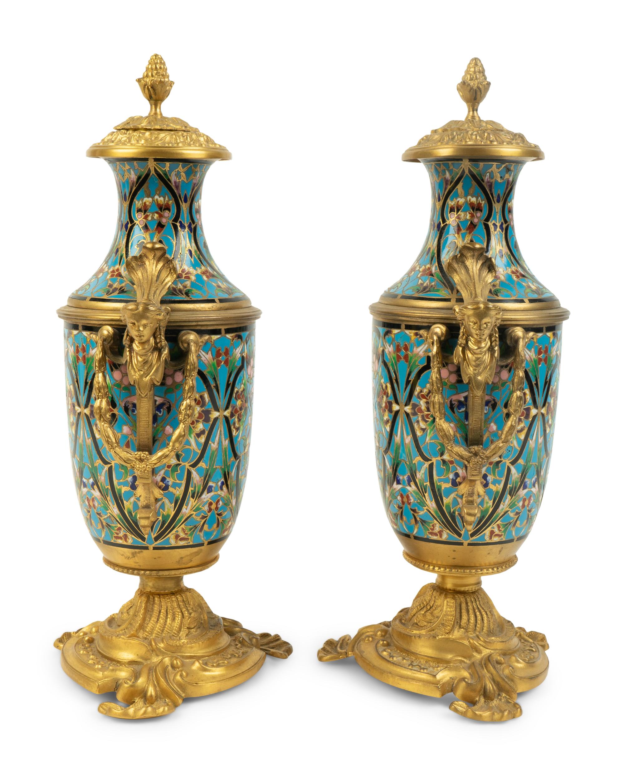 A Pair of French Gilt Bronze and Champleve Covered Urns — 19TH CENTURY