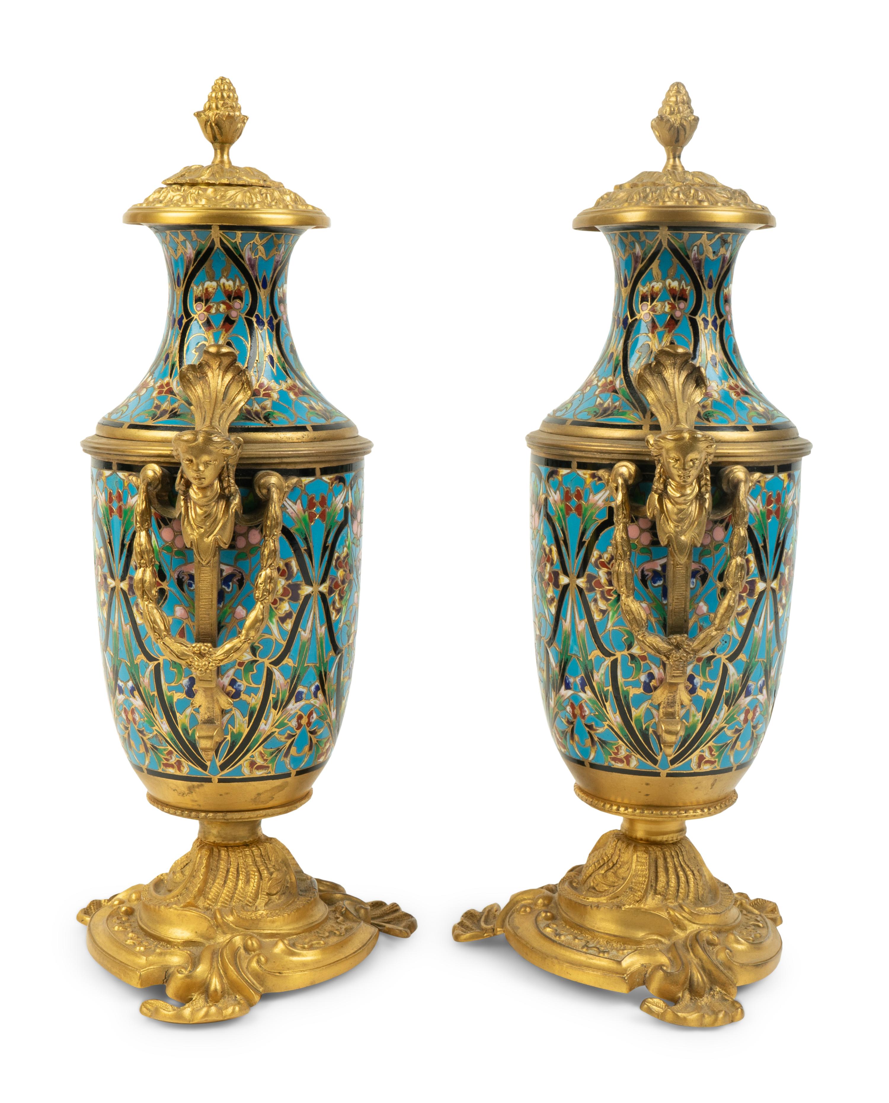A Pair of French Gilt Bronze and Champleve Covered Urns — 19TH CENTURY