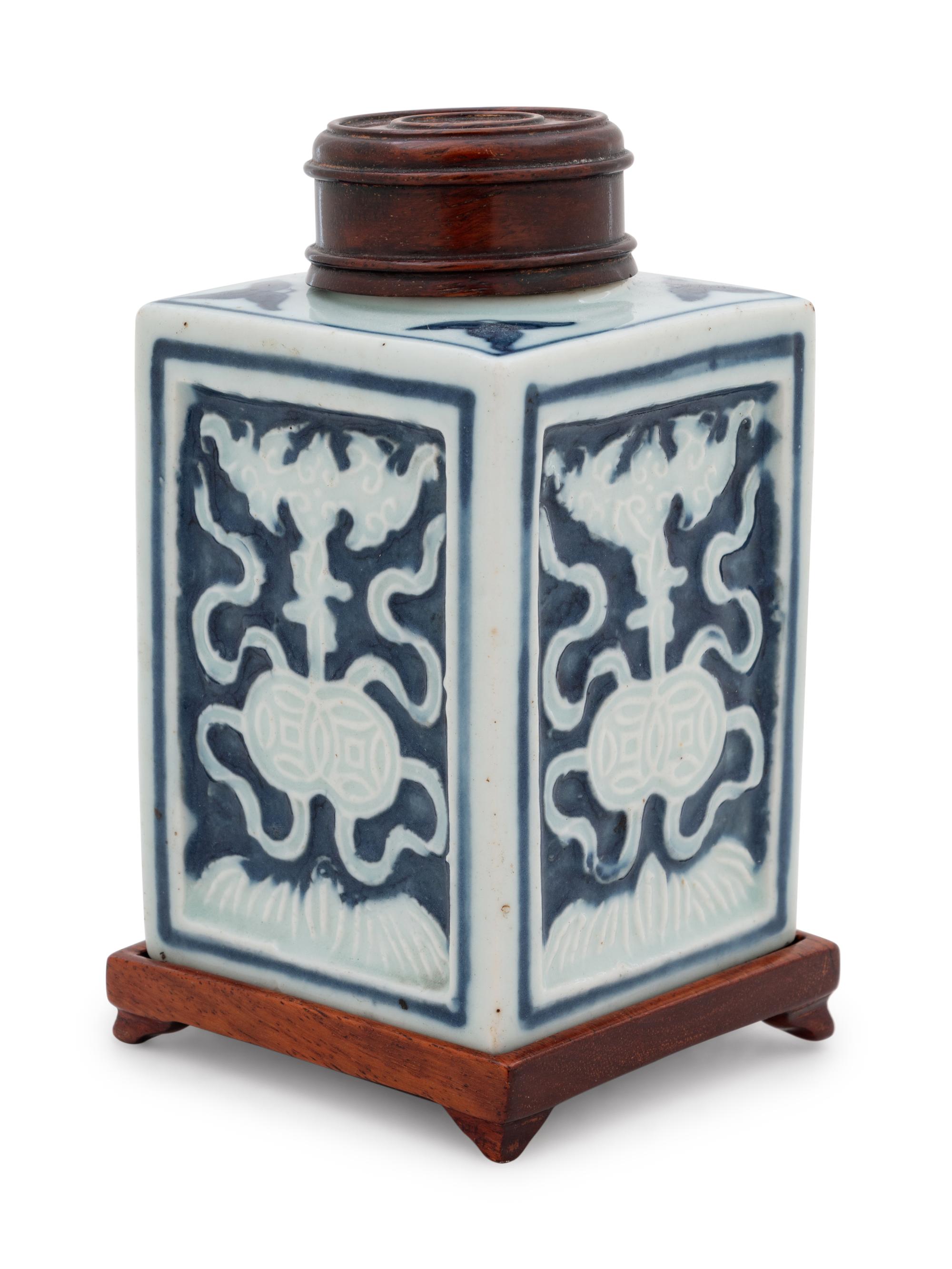 A Chinese White Slip Decorated Blue Ground Rectangular Tea Caddy
