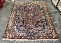 A Hamadan Wool Rug 6 feet 4 inches x 4 feet 6 1/2 inches. — CIRCA 1940