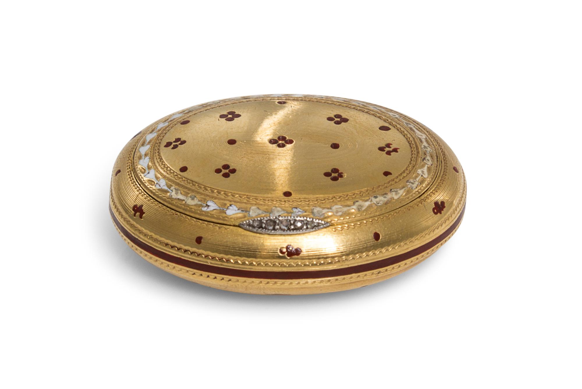 An English 18 Karat Yellow Gold Box, William Frederick Wright, London, 19th century, of oval form with a jeweled clasp and enameled qua