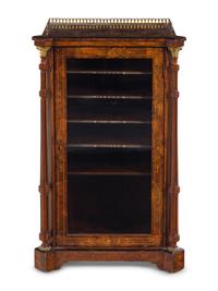 A Victorian Gilt Metal Mounted Burl Walnut Music Cabinet