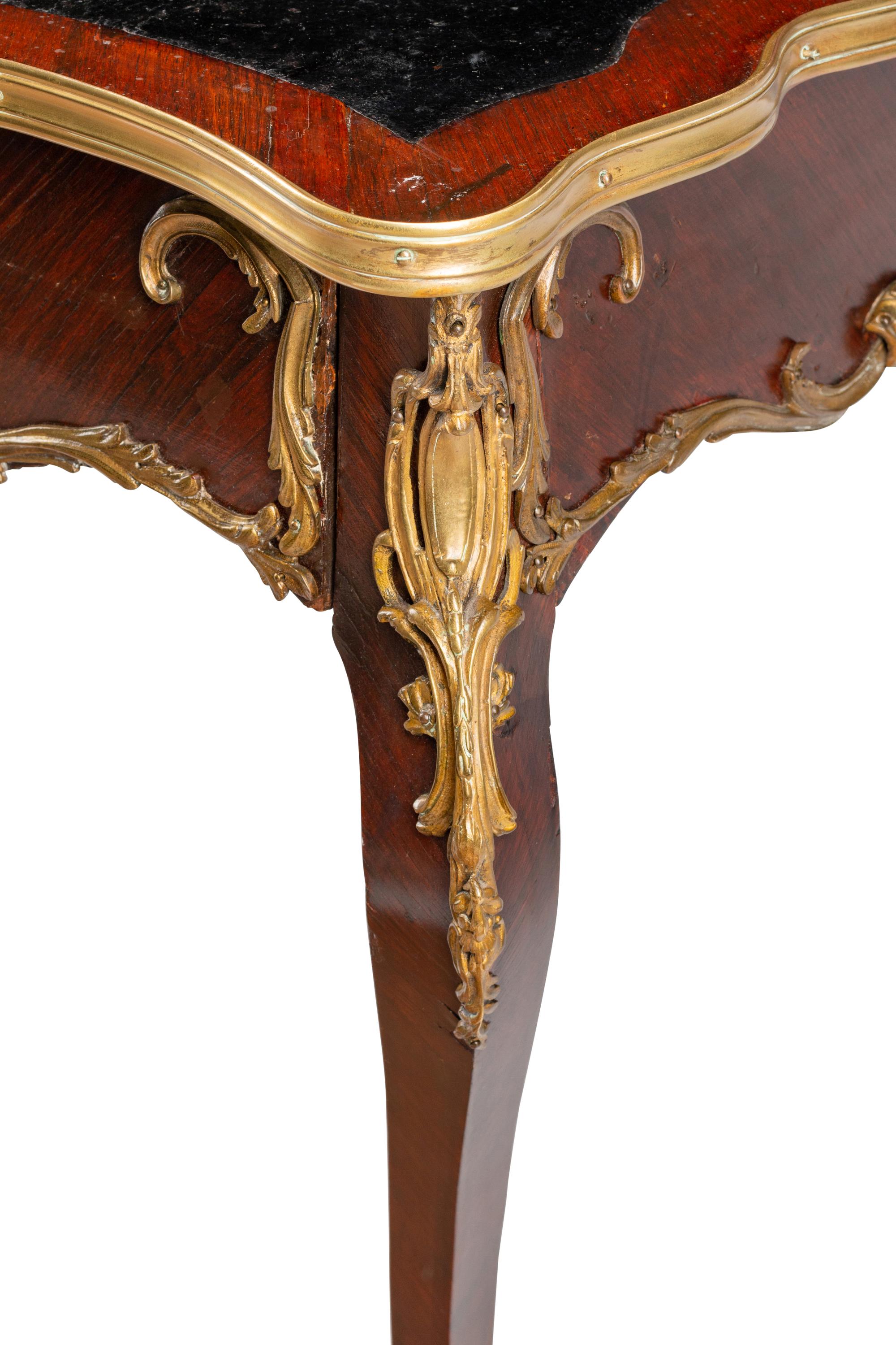 A Louis XV Style Gilt Bronze Mounted Kingwood Bureau Plat